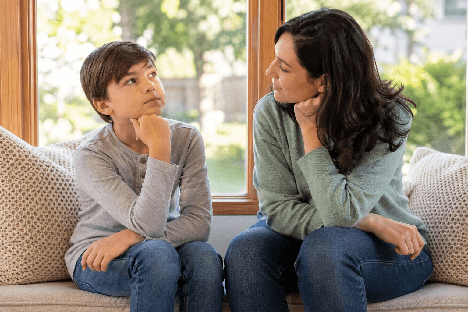 Caregiver giving a child time to think during a quiet conversation